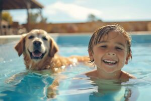 golden retriever swimming in pool with boy in northern virginia